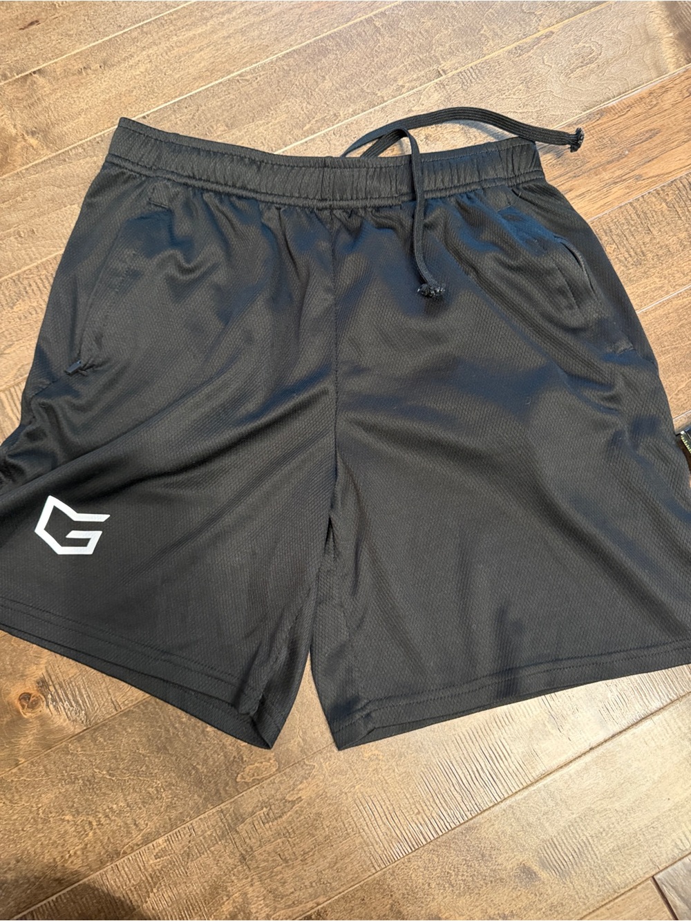 Amazon Black Men's Athletic Mesh Shorts with White Logo